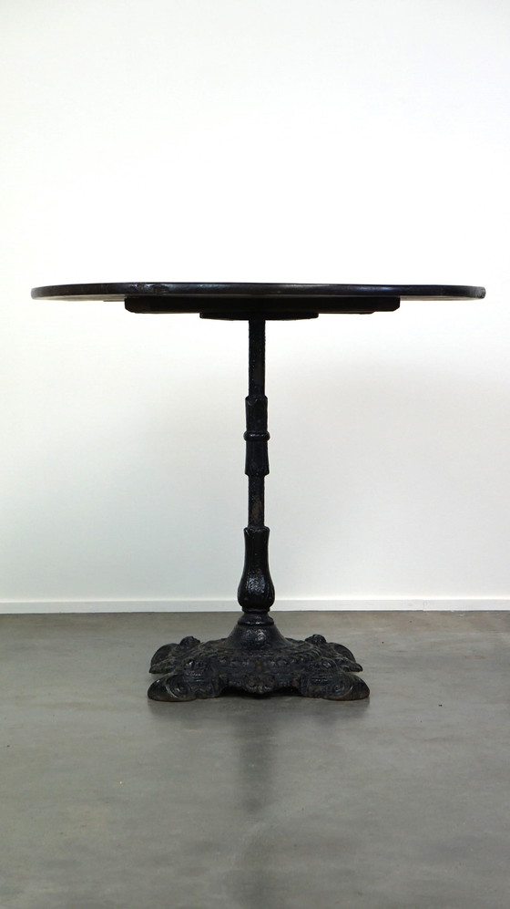 Image 1 of Round English pub table/ side table/ small dining table with cast iron leg and oak top