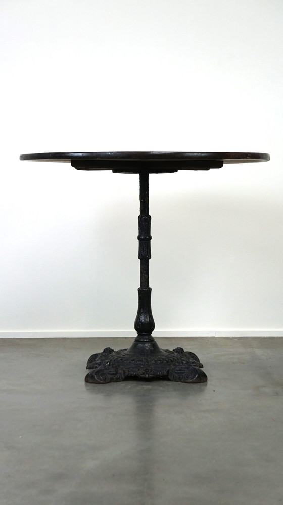 Image 1 of Round English pub table/ side table/ small dining table with cast iron leg and oak top