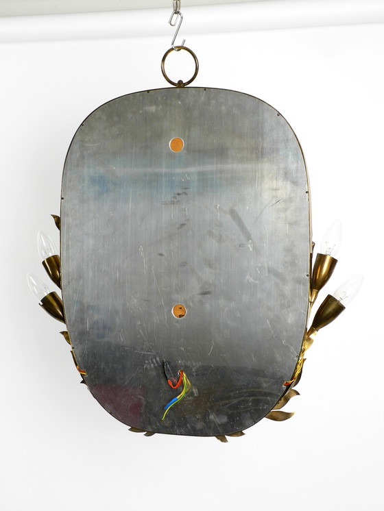 Image 1 of Large and heavy Mid Century floral brass mirror with lamps by Vereinigte Werkstätten