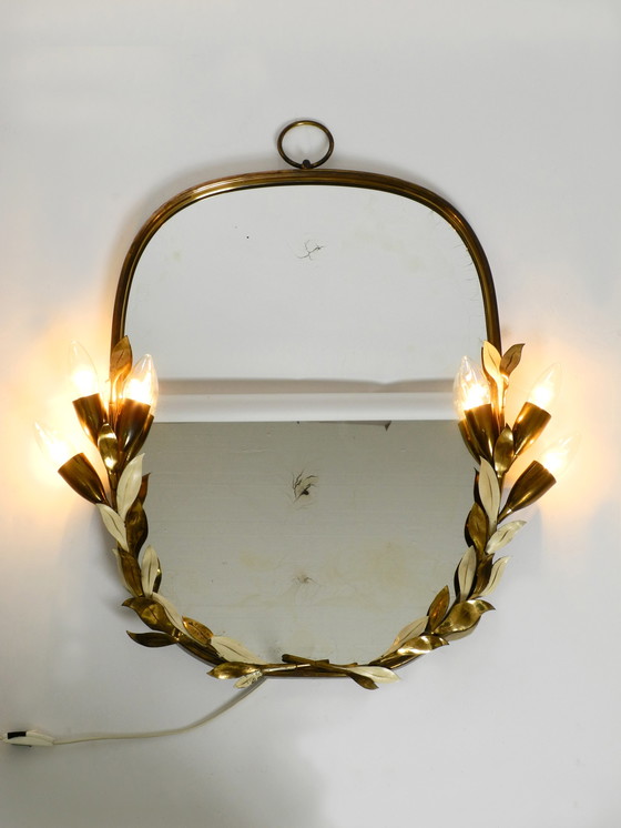 Image 1 of Large and heavy Mid Century floral brass mirror with lamps by Vereinigte Werkstätten