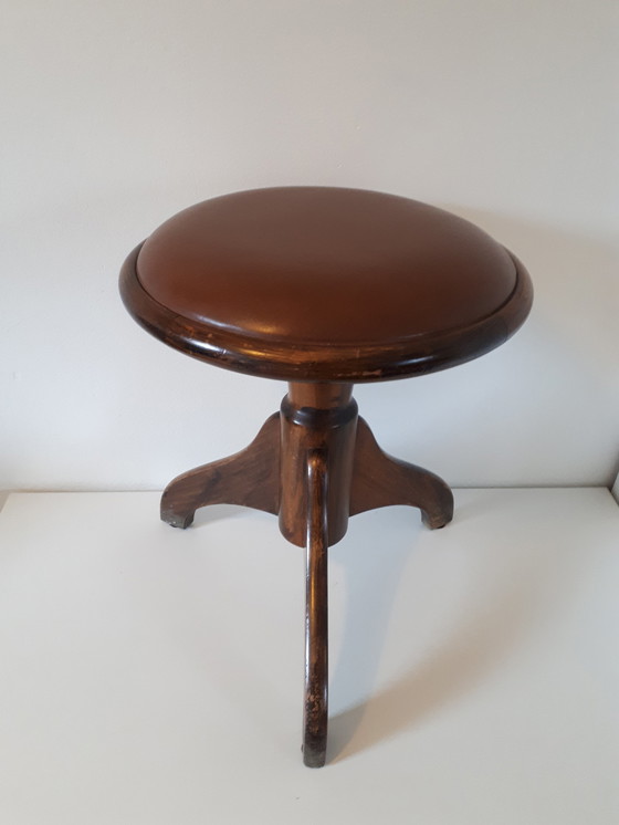 Image 1 of Tabouret de piano vintage pétrifié