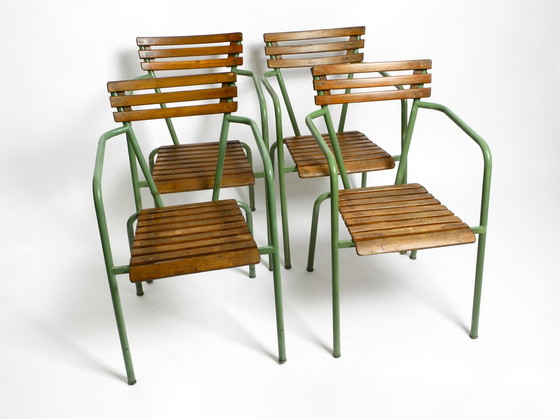 Image 1 of Four stackable Mid - Century bistro chairs made of metal and wood - Made in Italy