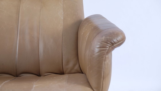 Image 1 of Vintage leather armchair with footstool