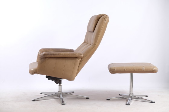 Image 1 of Vintage leather armchair with footstool