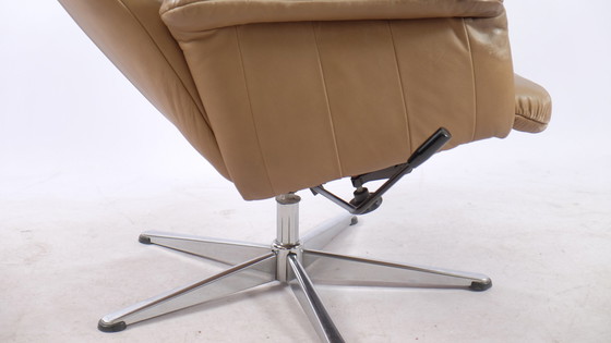 Image 1 of Vintage leather armchair with footstool