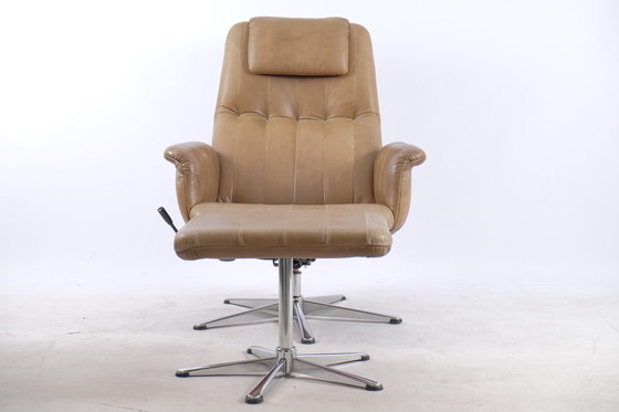 Image 1 of Vintage leather armchair with footstool