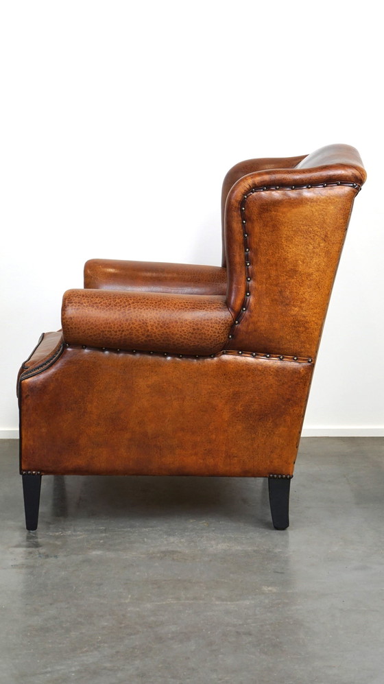 Image 1 of Fauteuil à oreilles en cuir de mouton