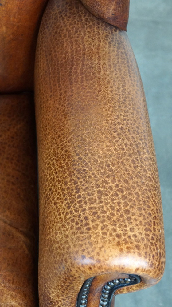 Image 1 of Fauteuil à oreilles en cuir de mouton