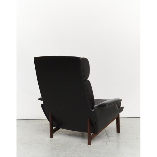 Vintage Adam armchair with ottoman in black leatherette by Kofod Larsen for Mogens Kold