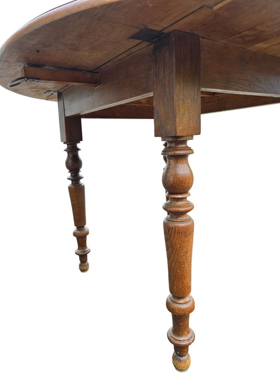 Image 1 of Round Antique Wooden Table with Folding Sides