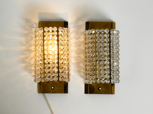 Two 1960s wall lamp made of brass with plexiglass beads