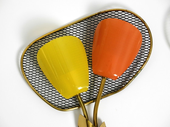 Image 1 of Pair of rare large Mid Century Modern expanded metal wall lamps with plexiglass shades - still new and never connected