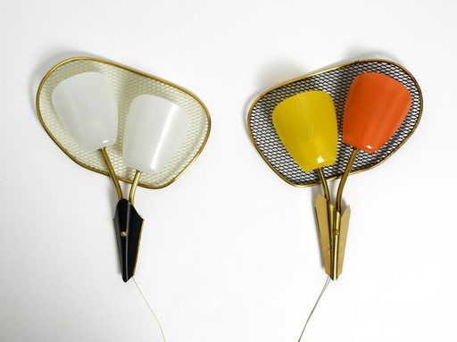 Pair of rare large Mid Century Modern expanded metal wall lamps with plexiglass shades - still new and never connected