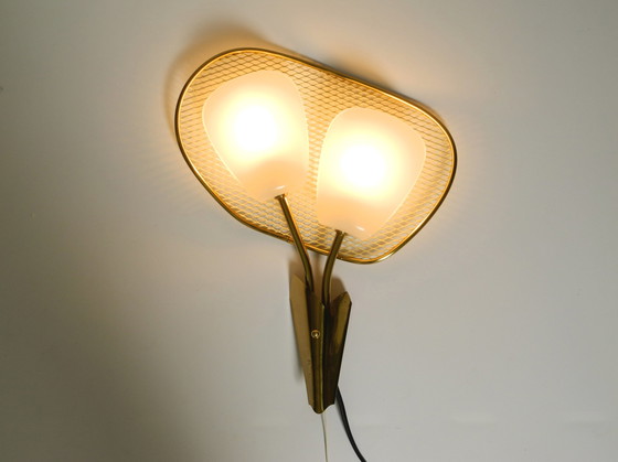 Image 1 of Pair of rare large Mid Century Modern expanded metal wall lamps with plexiglass shades - still new and never connected