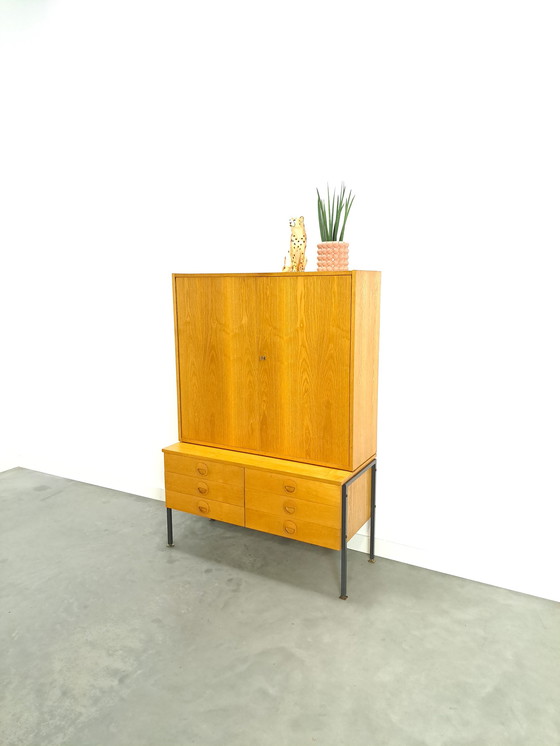 Image 1 of Hellerau veneer cabinet with steel legs and drawers