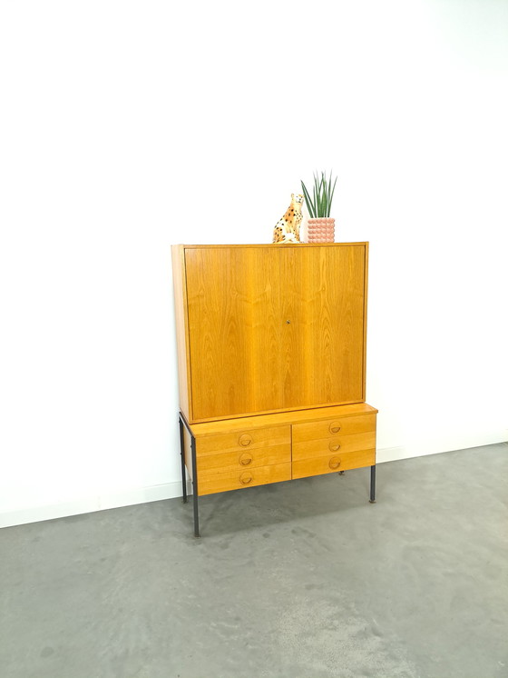 Image 1 of Hellerau veneer cabinet with steel legs and drawers