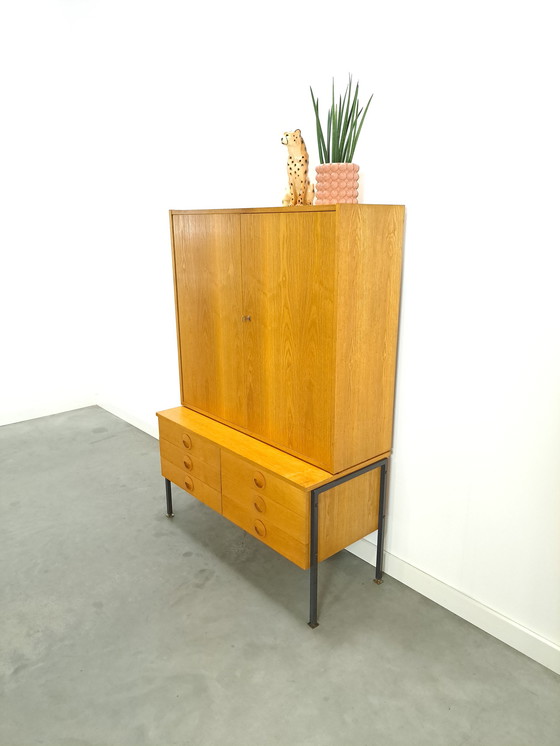 Image 1 of Hellerau veneer cabinet with steel legs and drawers