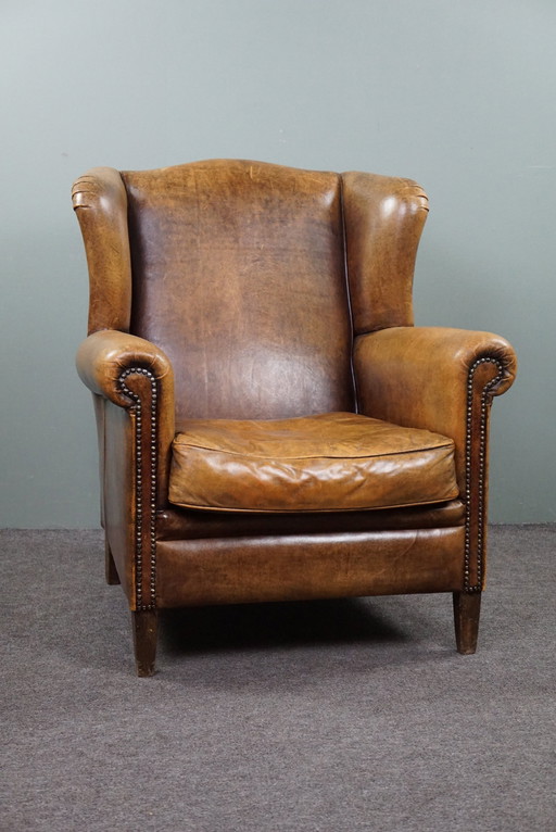 Comfortable sheepskin leather wing chair