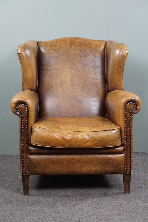 Comfortable sheepskin leather wing chair