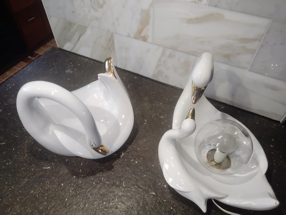 Image 1 of Luigi, 2 × white porcelain swans; 1 lamp and 1 fruit bowl.