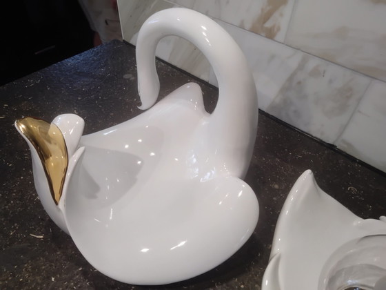 Image 1 of Luigi, 2 × white porcelain swans; 1 lamp and 1 fruit bowl.