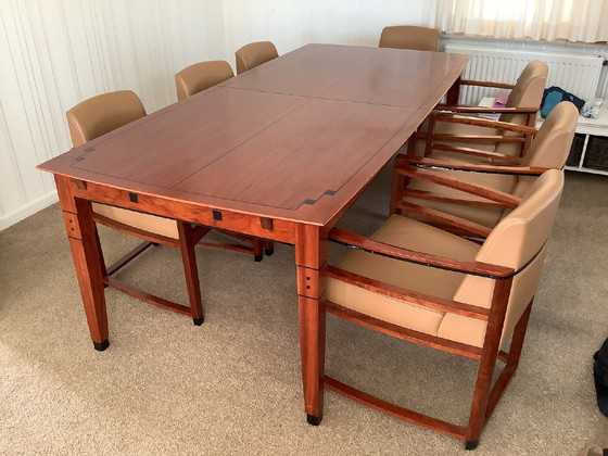 Image 1 of Schuitema cherry wood dining table with 8 chairs