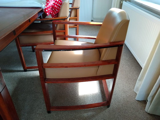 Image 1 of Schuitema cherry wood dining table with 8 chairs