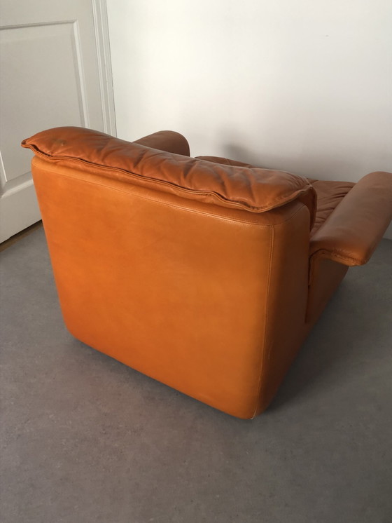 Image 1 of Vintage orange leather armchair with ottoman - footstool