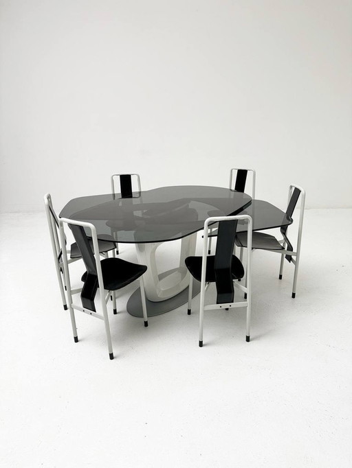 Set: Extendable table Orbital by Calligaris & 6 Irma chairs by Zanotta