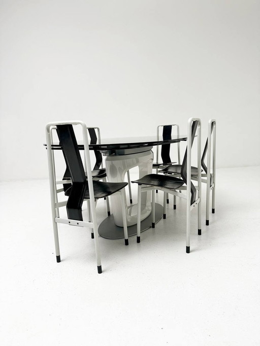 Set: Extendable table Orbital by Calligaris & 6 Irma chairs by Zanotta