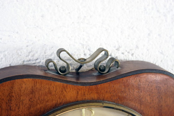 Image 1 of Clock Apple guarantor