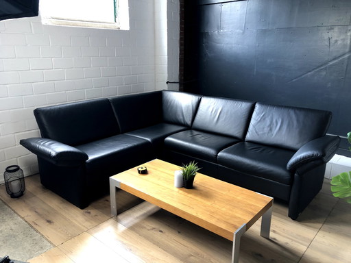 Leather sofa from Frommholz with removable seat cushions