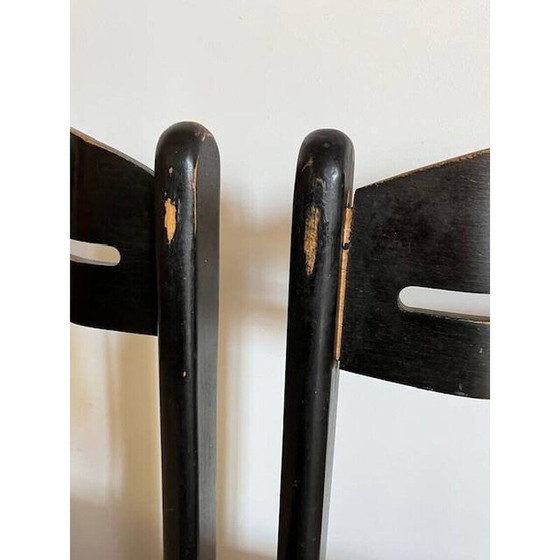 Image 1 of Pair of vintage black chairs in wood and white imitation leather