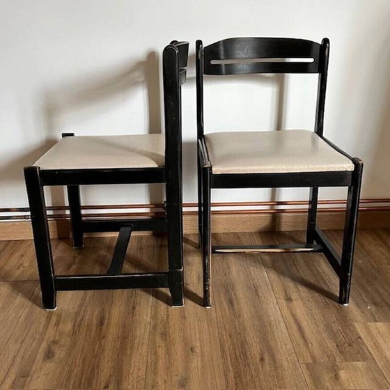 Image 1 of Pair of vintage black chairs in wood and white imitation leather