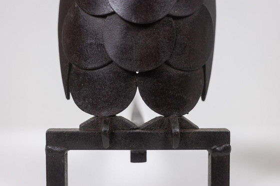 Image 1 of Coppia di alari in ferro raffiguranti un gufo. Anni '50.