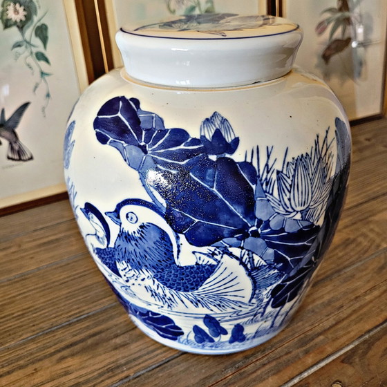 Image 1 of Chinese ceramic ginger pot / vase with white and blue decoration of birds and plants