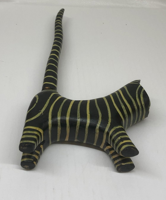 Image 1 of Wooden Cat Painted Black With Yellow Stripes