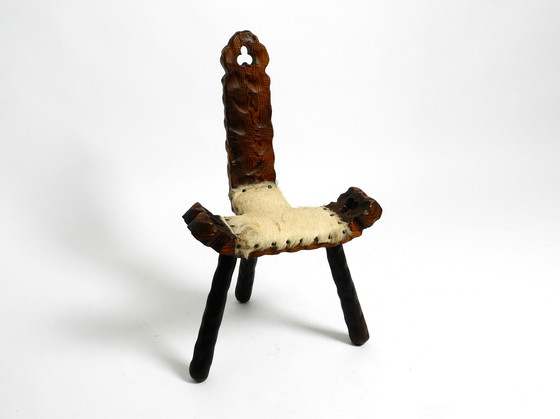 Image 1 of Mid Century three-legged stool cowhide