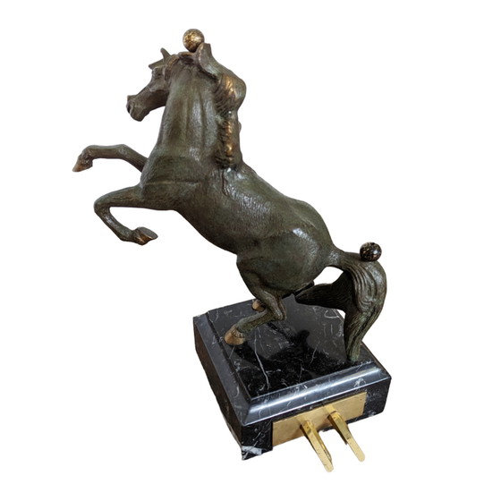 Image 1 of Table basse vintage bronze laiton chevaux