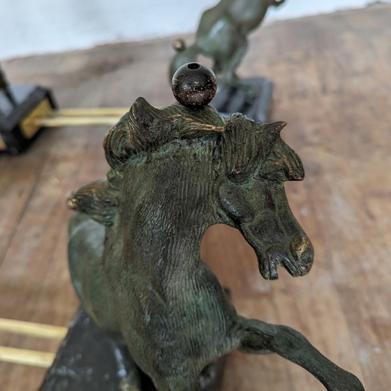 Image 1 of Table basse vintage bronze laiton chevaux