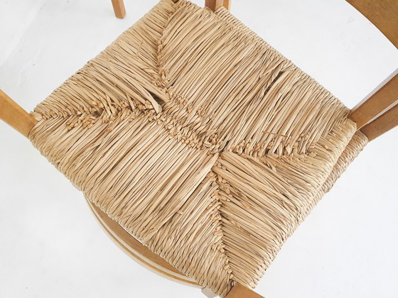 Image 1 of Ensemble de quatre chaises de salle à manger en chêne et sisal modèle 401 par J.L Moller, Danemark années 1970