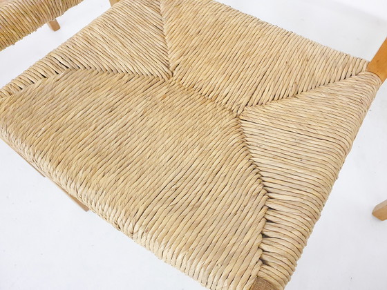 Image 1 of Ensemble de quatre chaises de salle à manger en chêne et sisal modèle 401 par J.L Moller, Danemark années 1970