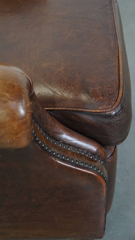 Image 1 of Dark Sheepskin Armchair On Wheels