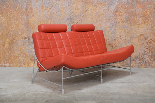 Red leather Leolux Volare two-seater sofa