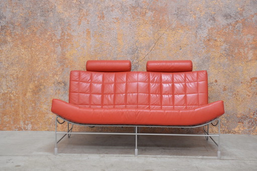 Red leather Leolux Volare two-seater sofa