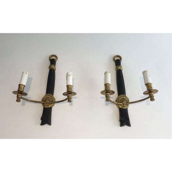 Image 1 of Coppia di applique in bronzo laccato nero con decorazione a testa di leone.