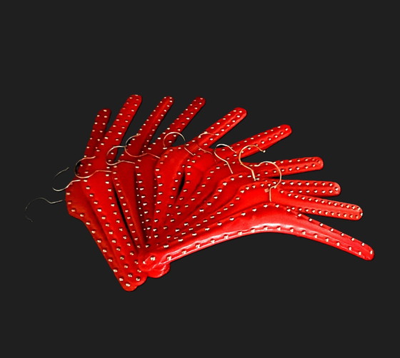 Image 1 of Fifties Red Coat Hangers With Nails