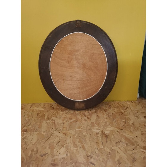 Image 1 of Vintage oval mirror with carved wood and gilded stucco decoration