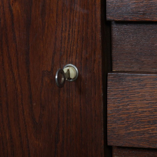 Vintage stained oak chest of drawers model U-458 by Jiri Jiroutek, 1960