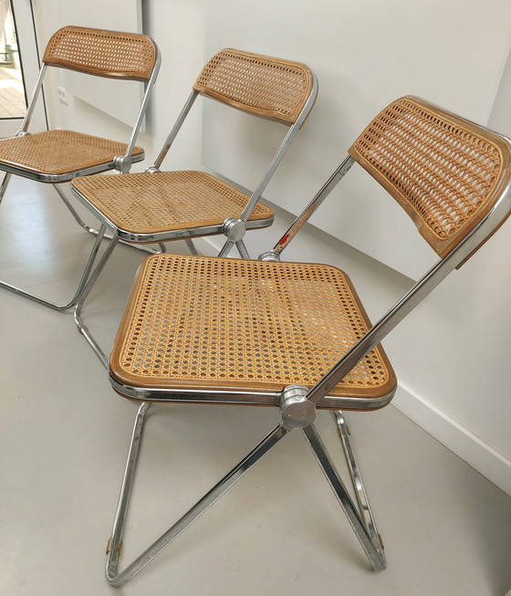 Image 1 of 3x Castelli Plia folding cane chair by Giancarlo Piretti